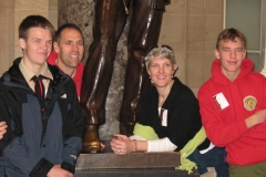 11a_hanging_by_a_statue